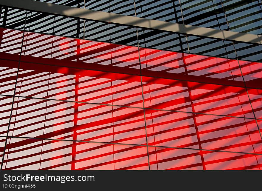 Modern facade close-up picture, steel structure reflecting on the glass. Modern facade close-up picture, steel structure reflecting on the glass