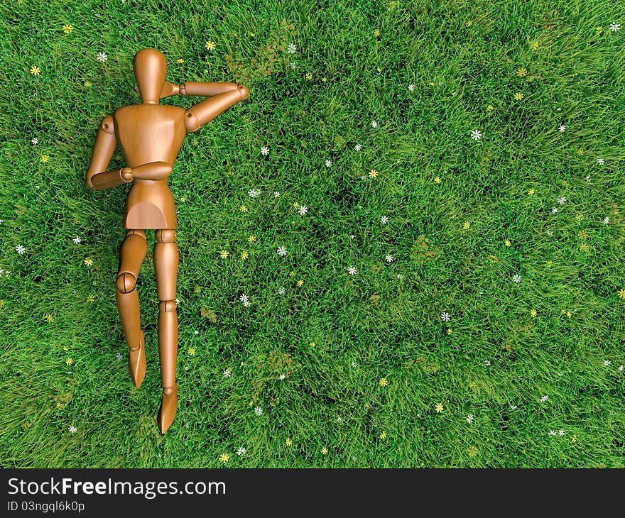 Full body of Wooden man is sleeping in the field of grass and small flowers. Full body of Wooden man is sleeping in the field of grass and small flowers.