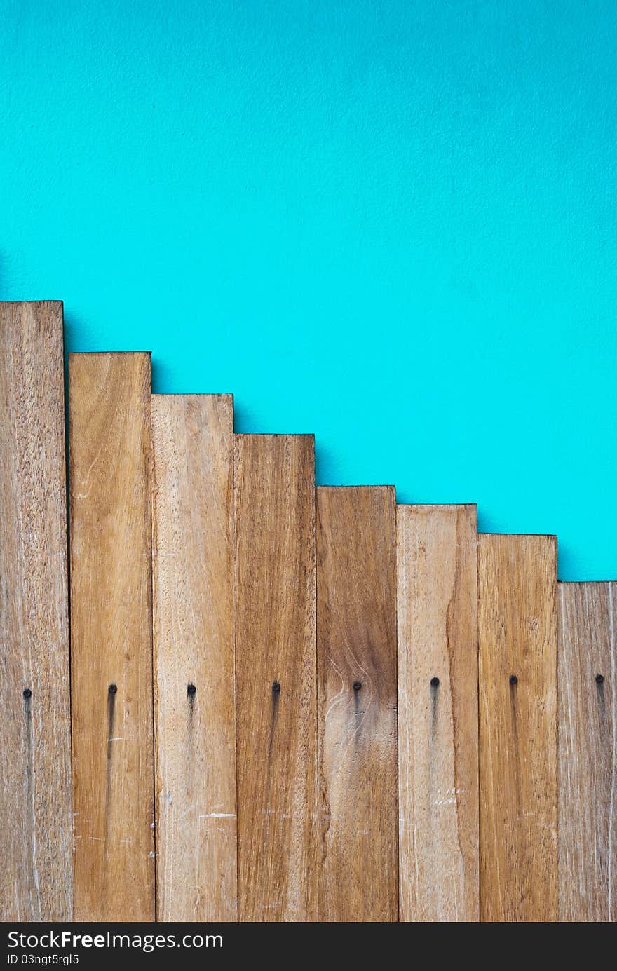 Woods step on blue background