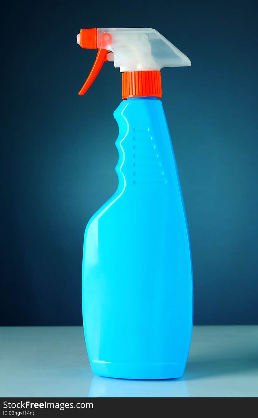 Bottle Of Detergent On A Blue Background