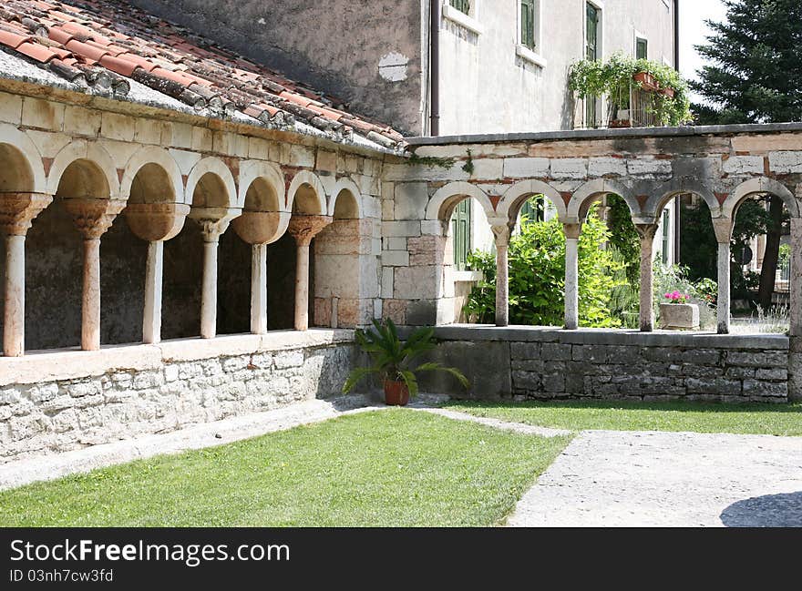 Ancient cloister of the romanesque church of San Giorgio