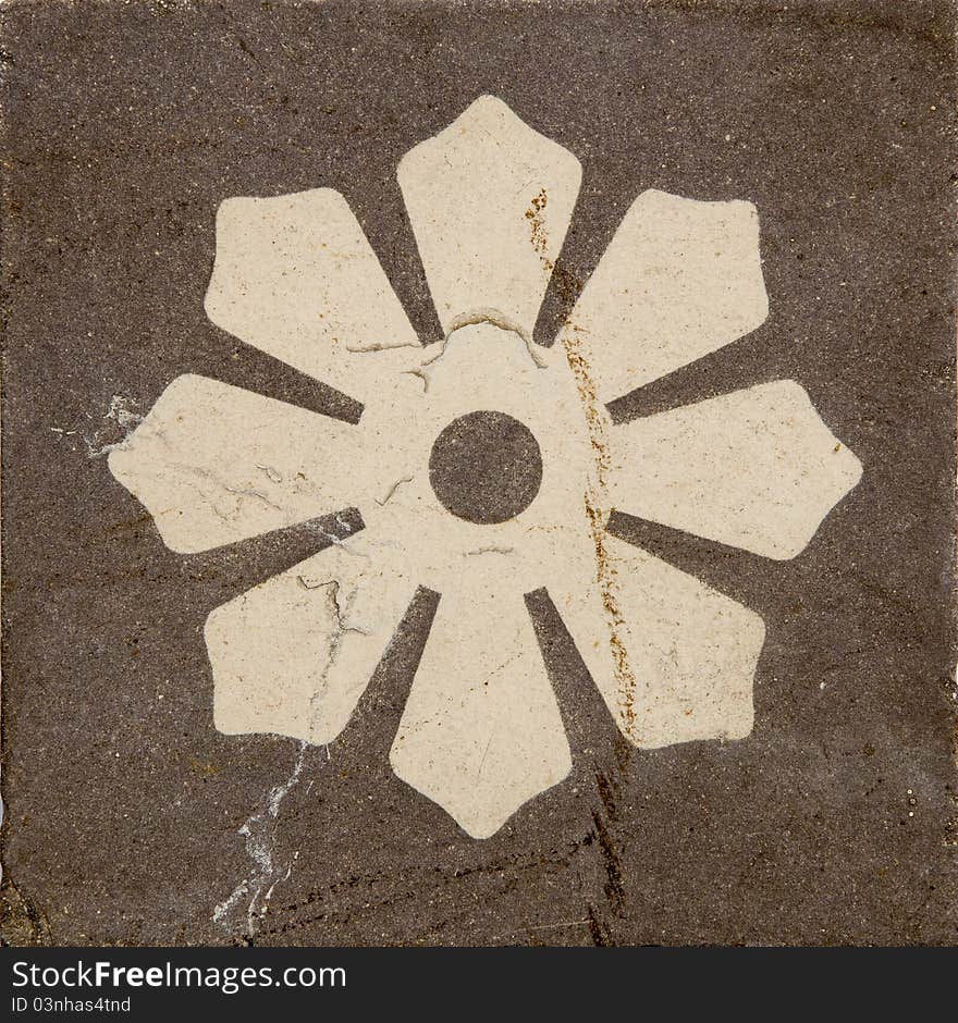 Grunge and cracked old floor ornamental tile. Grunge and cracked old floor ornamental tile