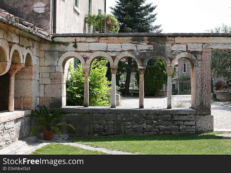 Ancient cloister of the romanesque church of San Giorgio