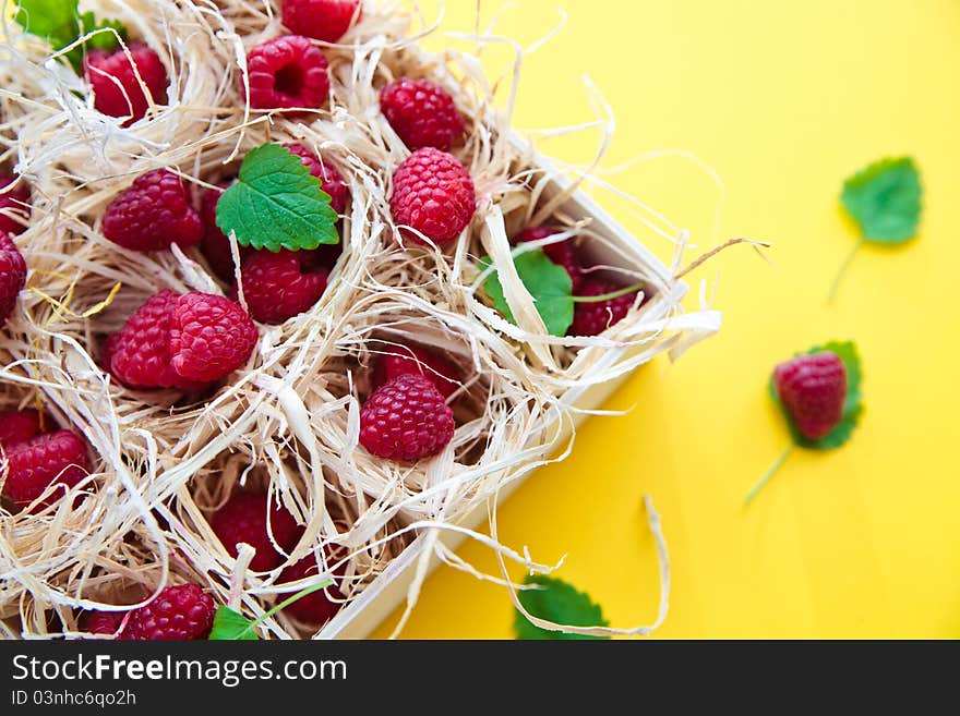 Raspberries In A Wood Box