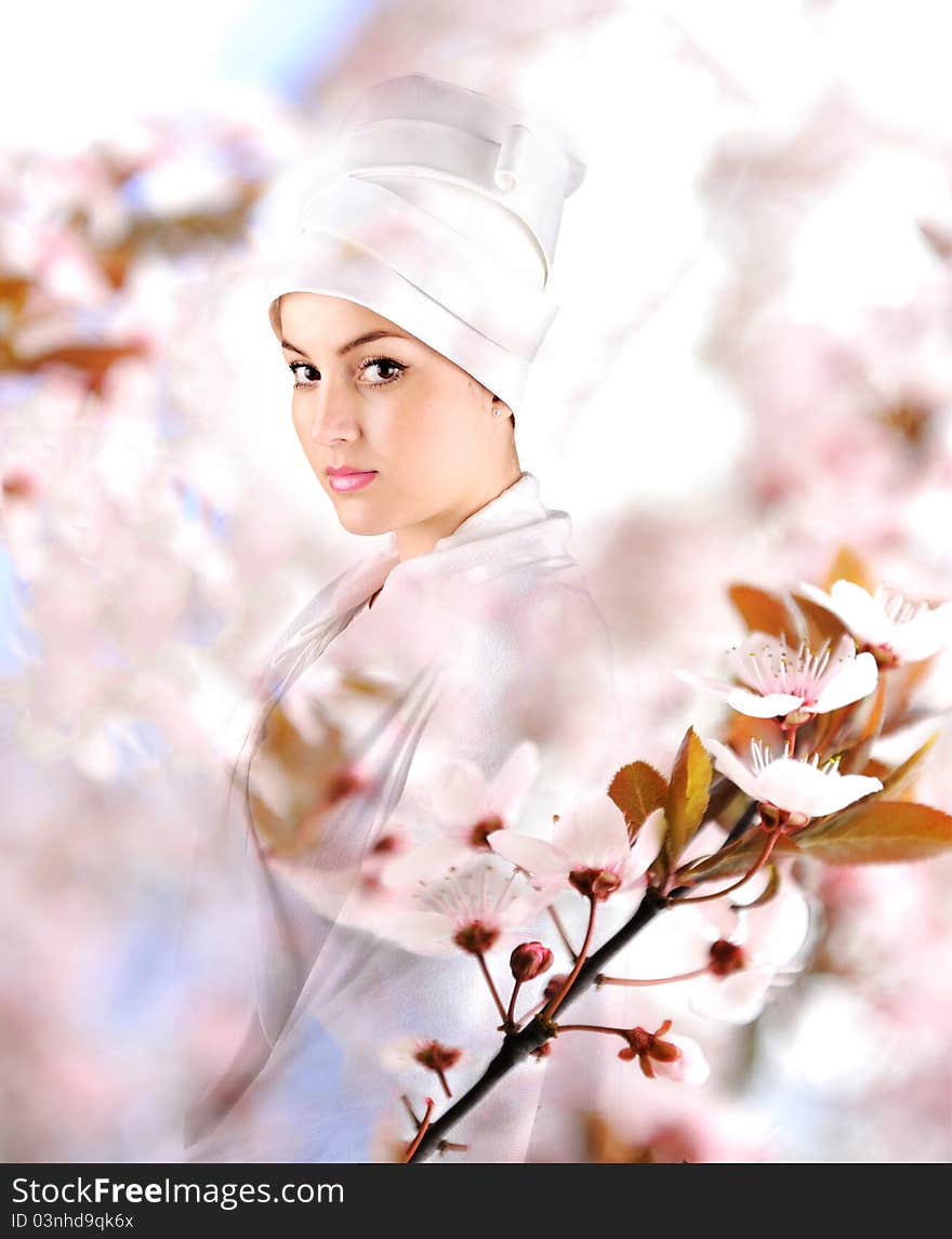 White beautiful geisha on beautiful background