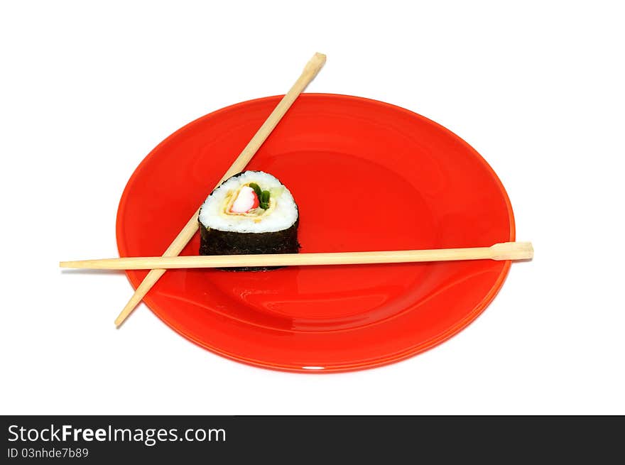 Traditional Japanese sushi on a red plate, isolated on white background. Traditional Japanese sushi on a red plate, isolated on white background