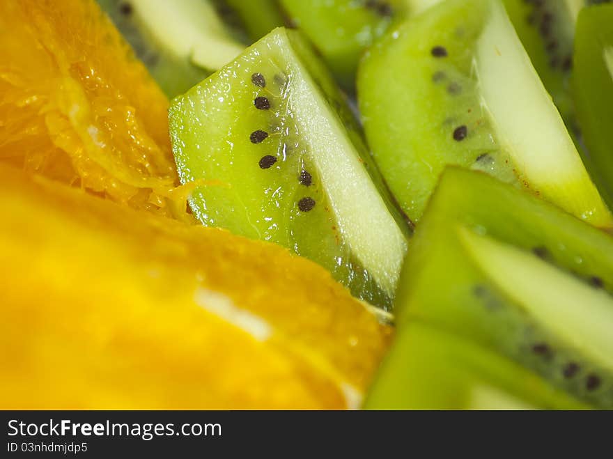 Fresh cut kiwi and orange slices. Fresh cut kiwi and orange slices