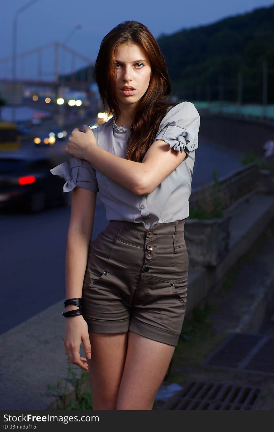 Fashion shoot of young women against the blue sky