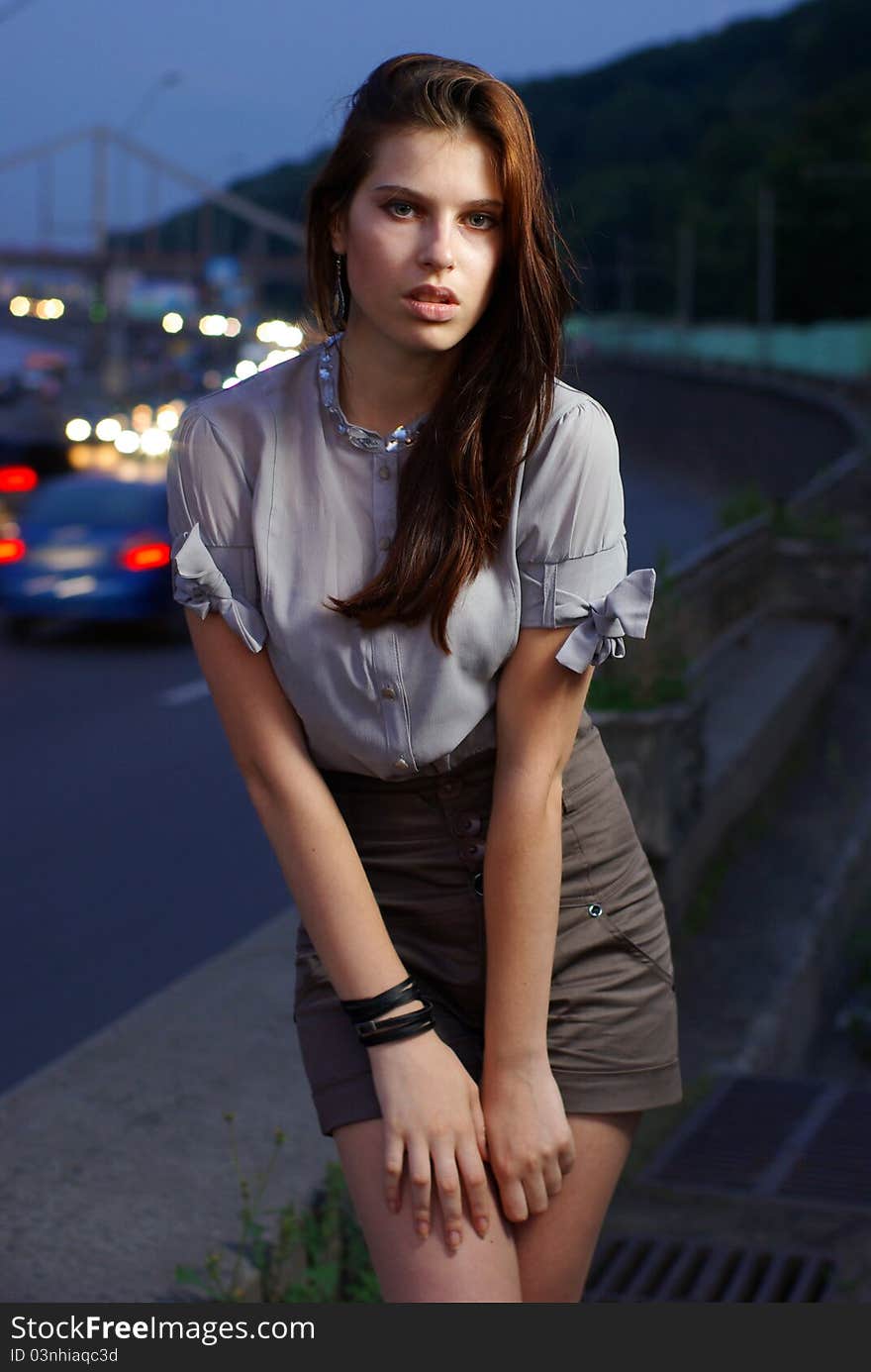 Fashion shoot of young women against the blue sky