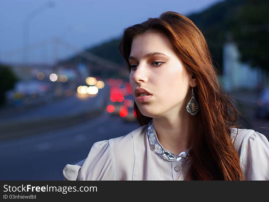 Fashion shoot of young women against the blue sky