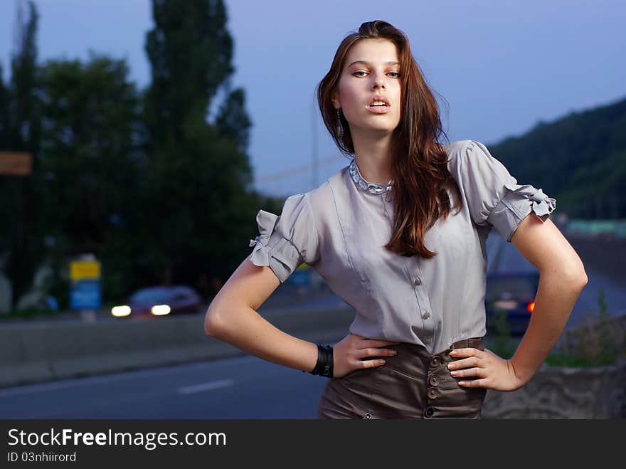 Fashion shoot of young women against the blue sky