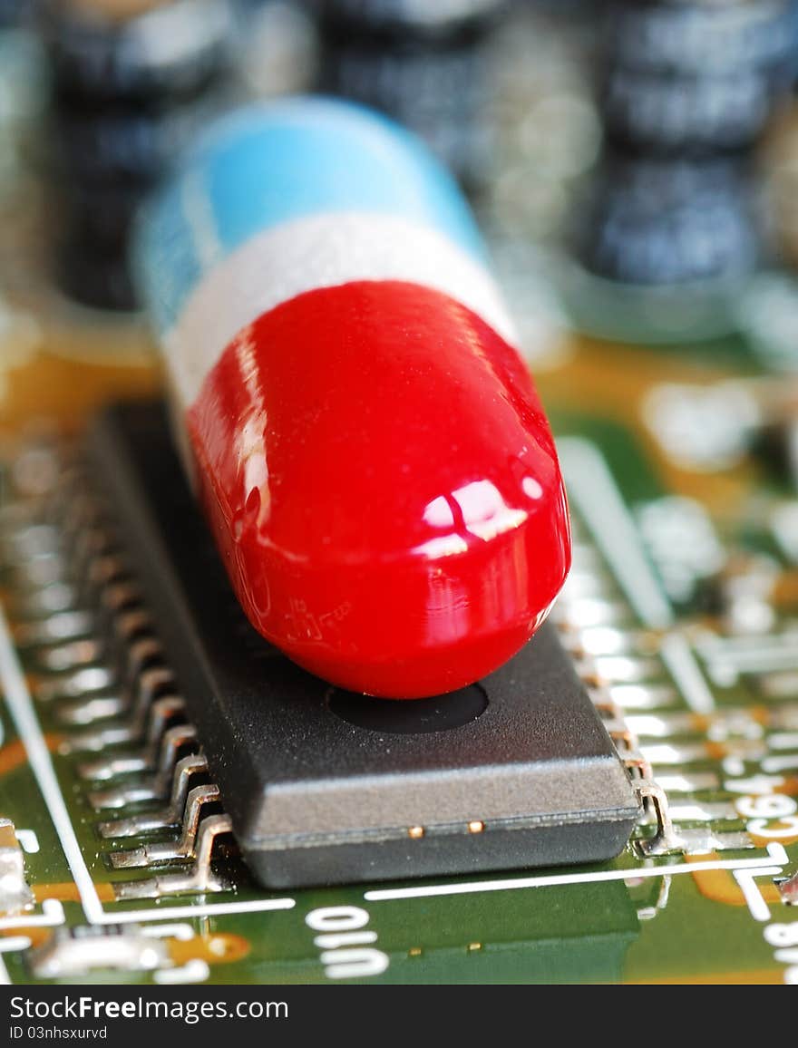 A pill on a computer chip