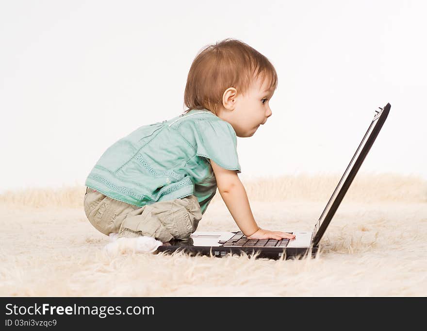 Little girl and laptop