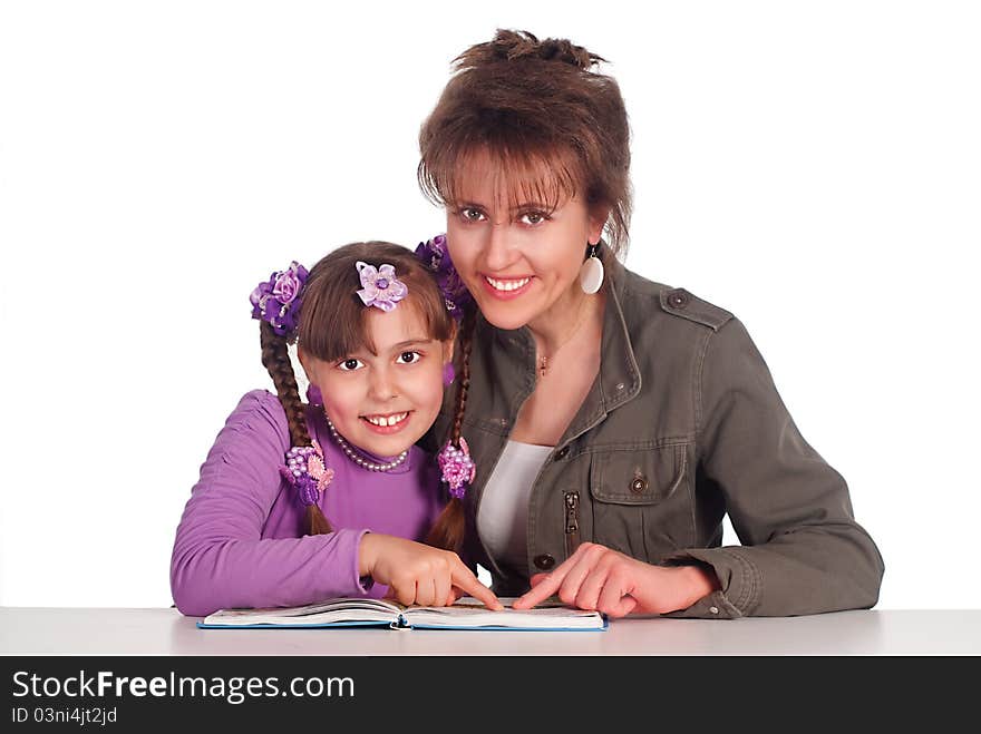 Mom reads with daughter