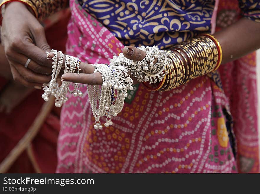 Indian woman showing traditional jewelry. Indian woman showing traditional jewelry