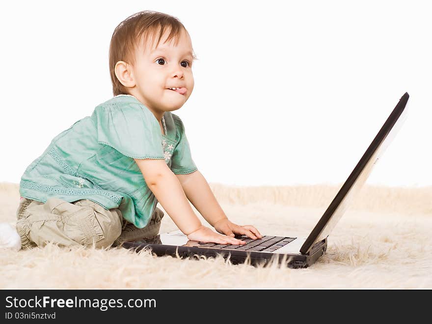 Little girl and laptop