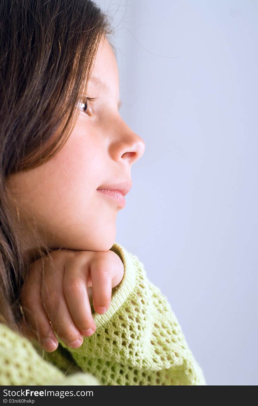 Portrait of a cute little girl dreaming. Portrait of a cute little girl dreaming