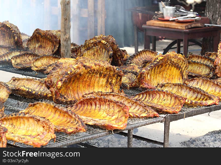 Barbecue ribs of lamb cooked in the coals of fire. Barbecue ribs of lamb cooked in the coals of fire