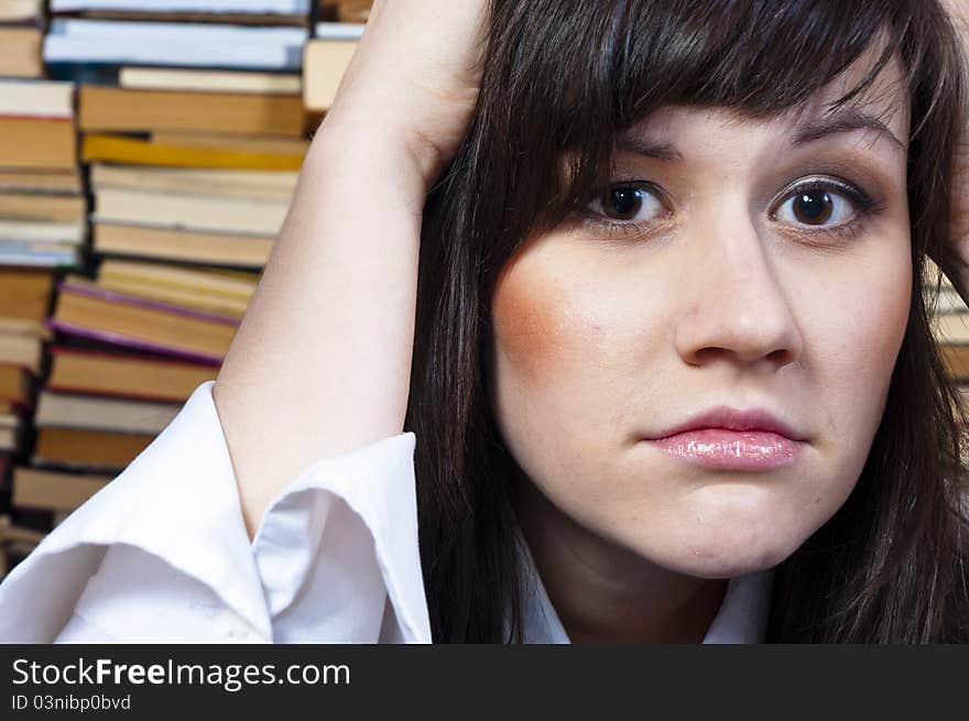 Young student girl with worried expression on her face