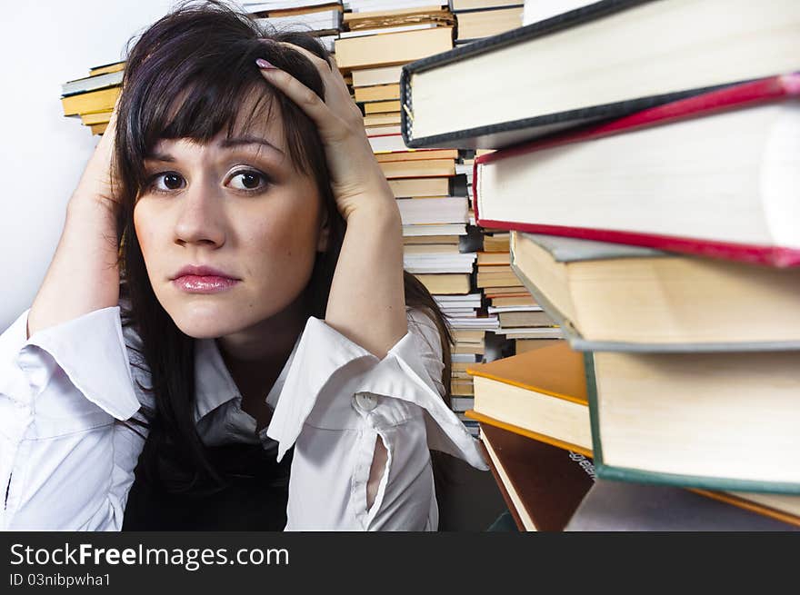 Young student girl with worried expression on her face