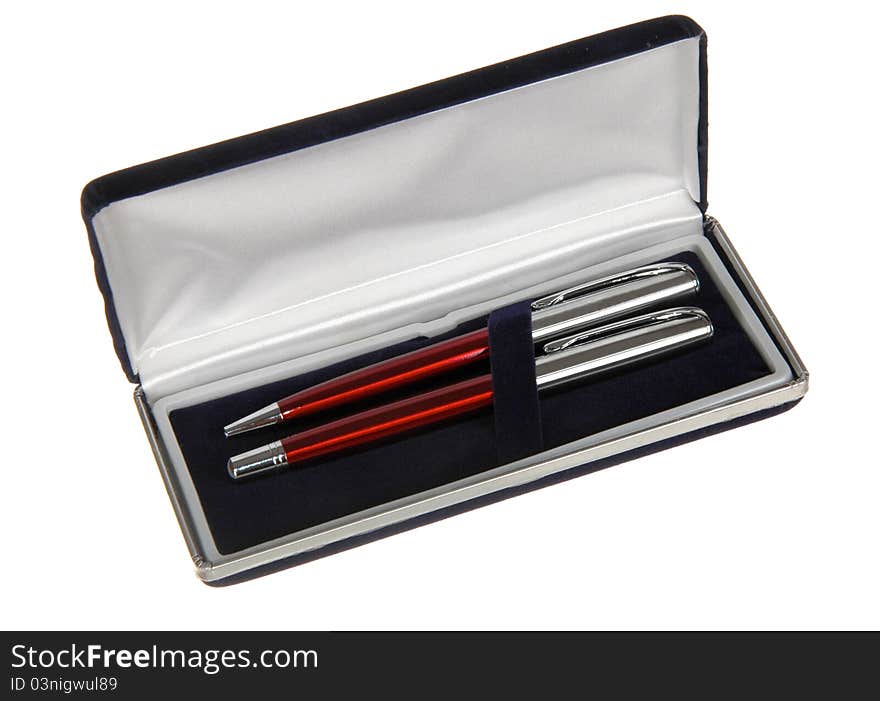 Two pens in black velvet box isolated on white