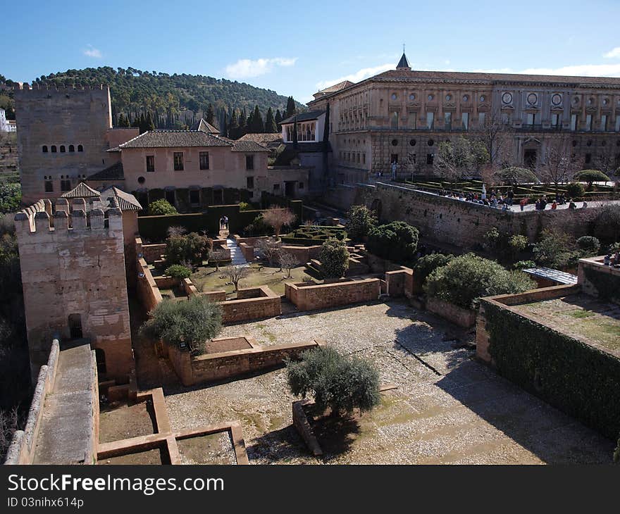 A view overlooking the old ruins of the Alhambra palace buildings on a nice sunny day.