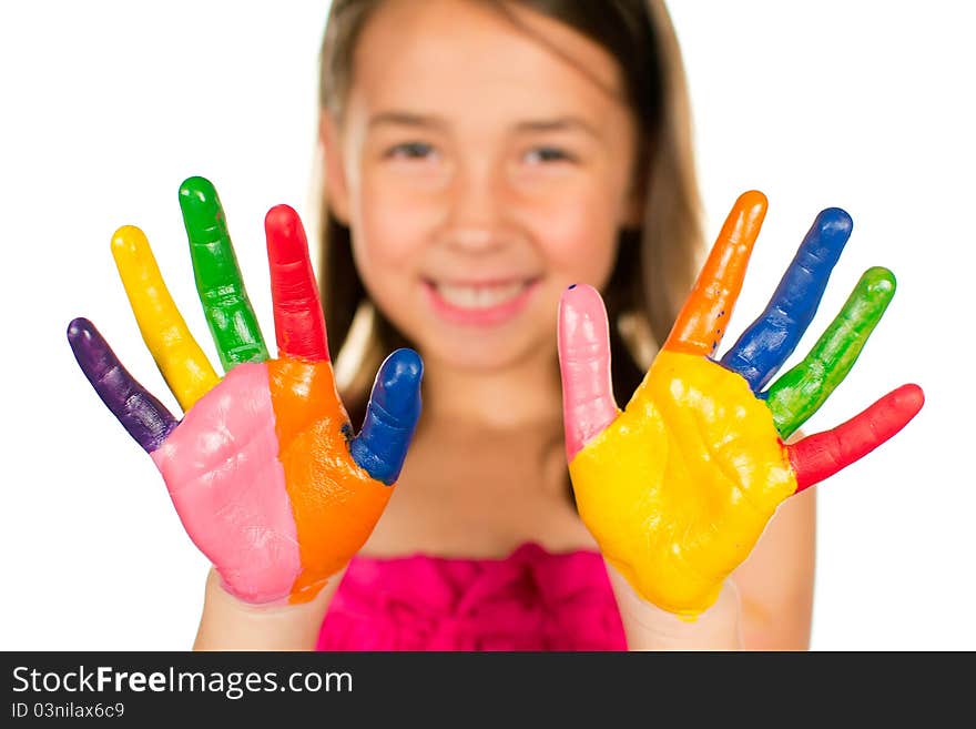 Happy little girl with colored hands. Happy little girl with colored hands