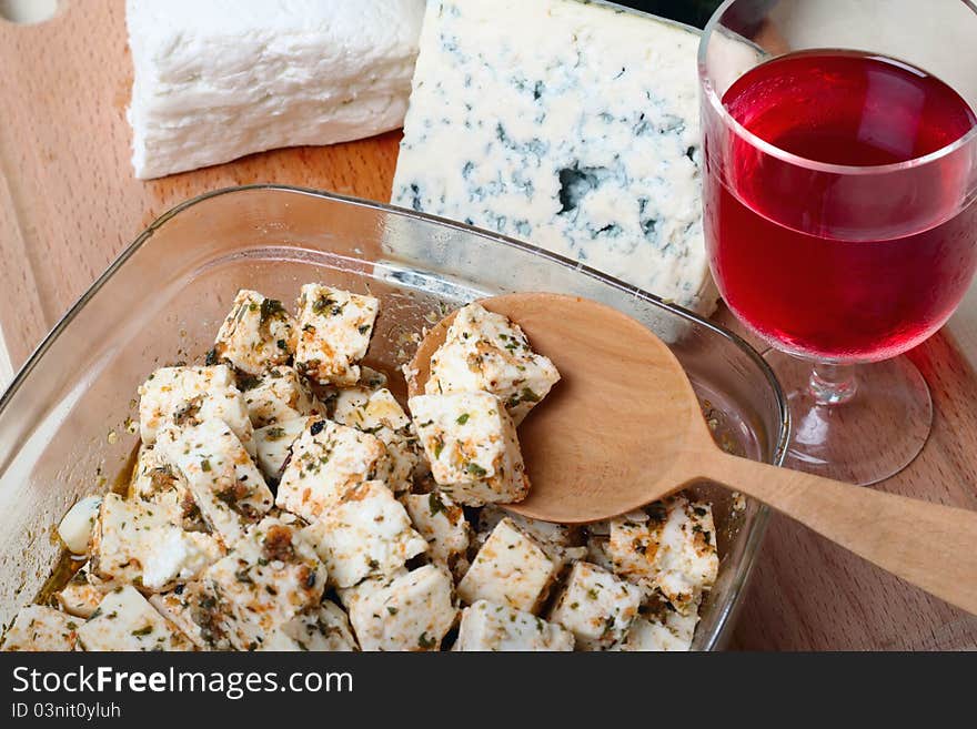 Red wine with different sorts of cheese. Red wine with different sorts of cheese