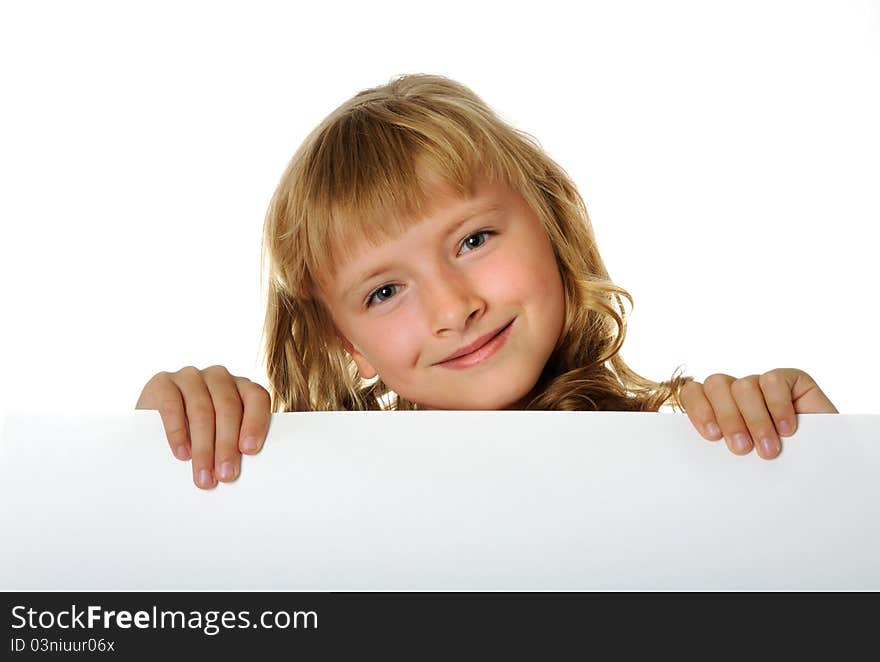 Smiling girl holding white  sheet of a paper, isolated. Smiling girl holding white  sheet of a paper, isolated