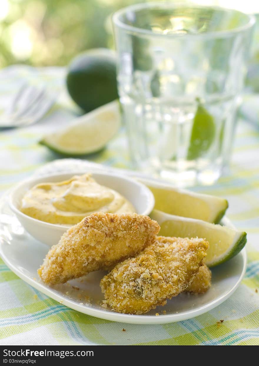 Fresh chicken nuggets with mustard sauce. Selective focus