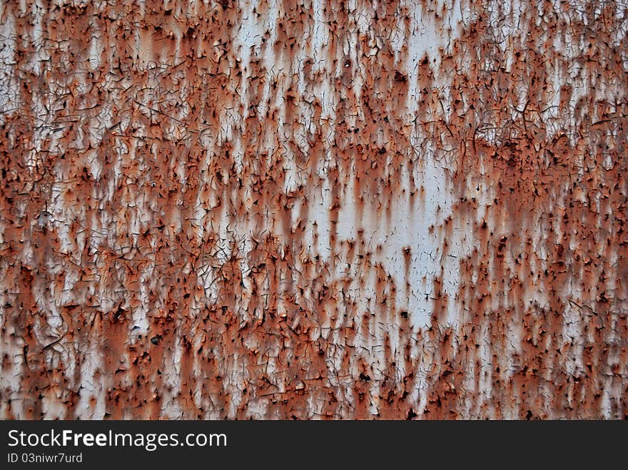 Rusty old painted door outside