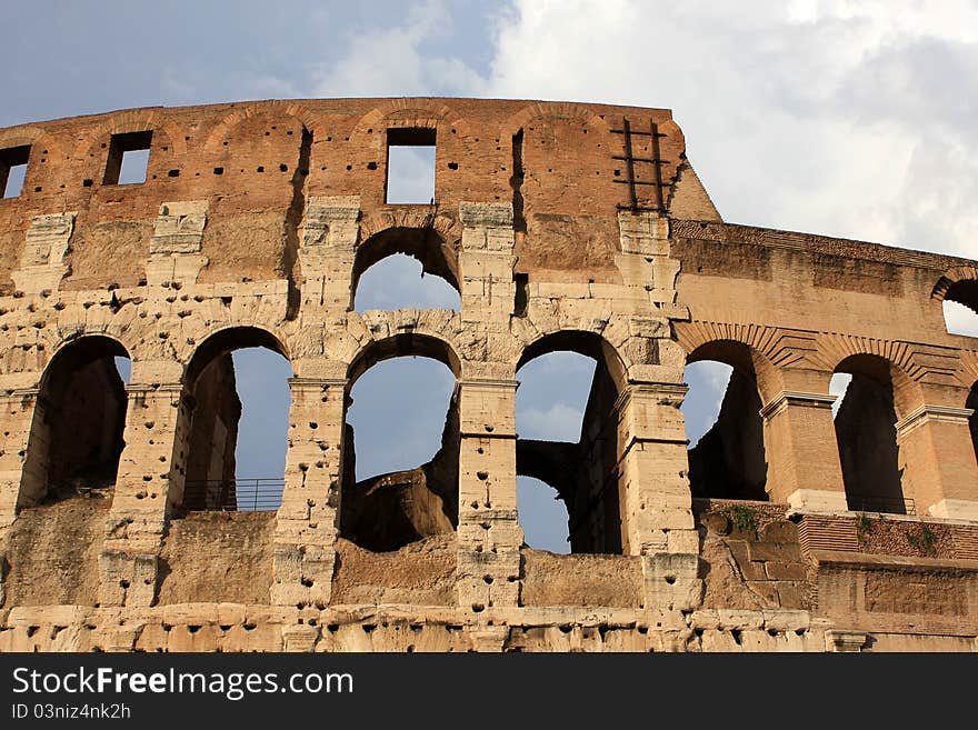 Colloseum (Coliseum) is an amphitheater in the center of Rome, Italy. Colloseum (Coliseum) is an amphitheater in the center of Rome, Italy