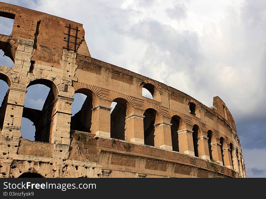 Colloseum (Coliseum) is an amphitheater in the center of Rome, Italy. Colloseum (Coliseum) is an amphitheater in the center of Rome, Italy