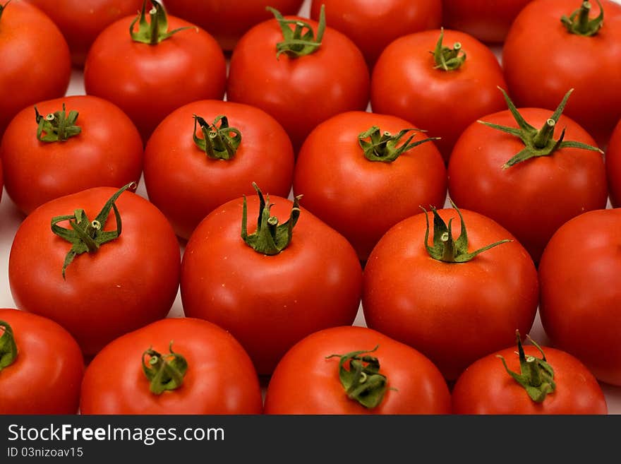 A close up shots of a bunch of tomatoes