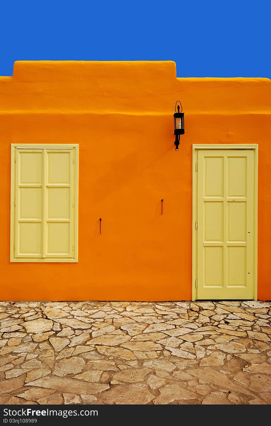 Orange greek house in Balatonfured, Hungary