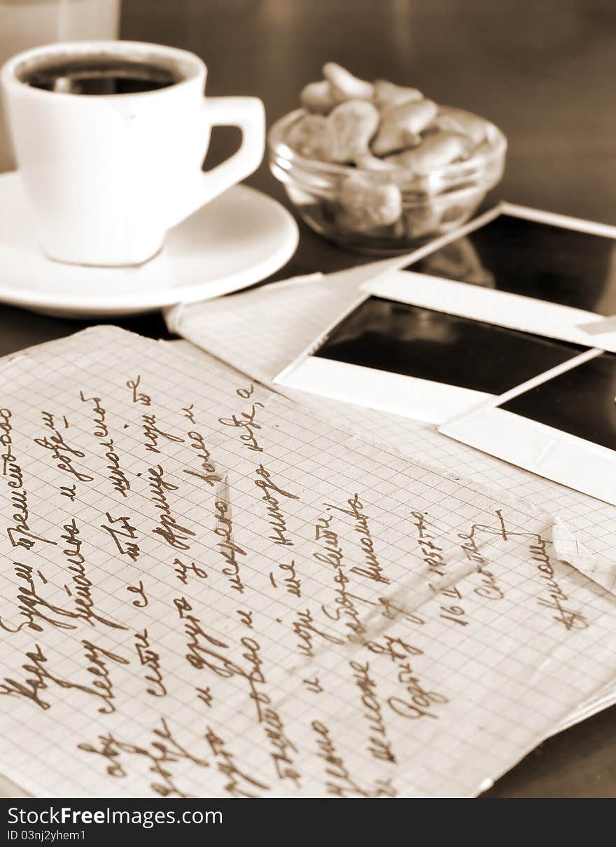 Old letters and pictures with morning coffee,sepia added photo. Old letters and pictures with morning coffee,sepia added photo