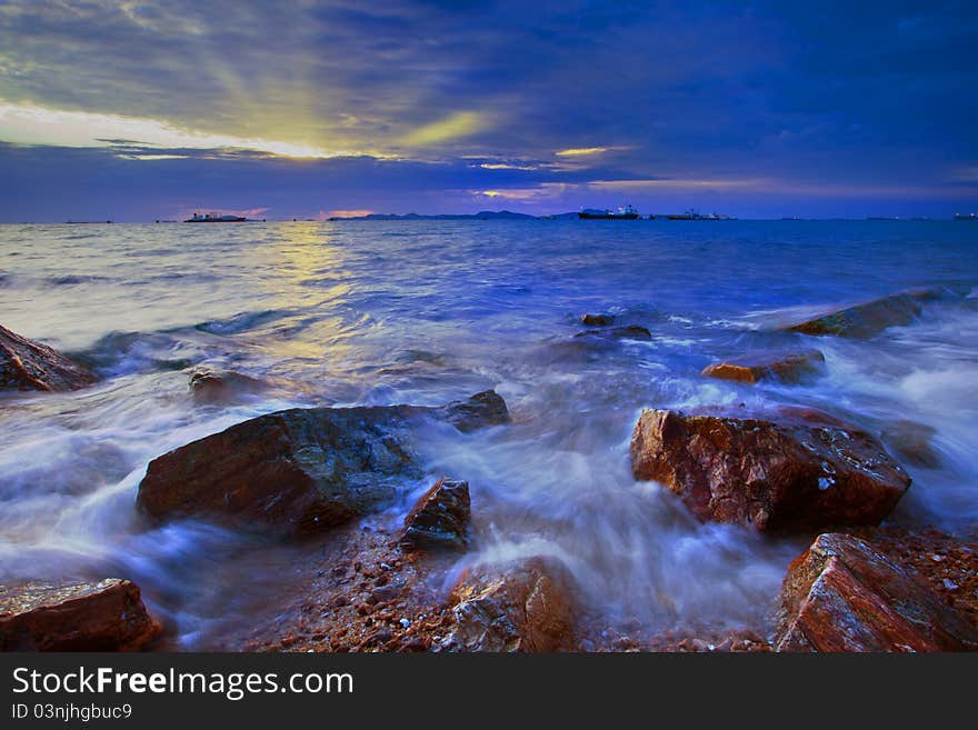 Sunset at laemchabung thailand the dusky time at the lonely coast