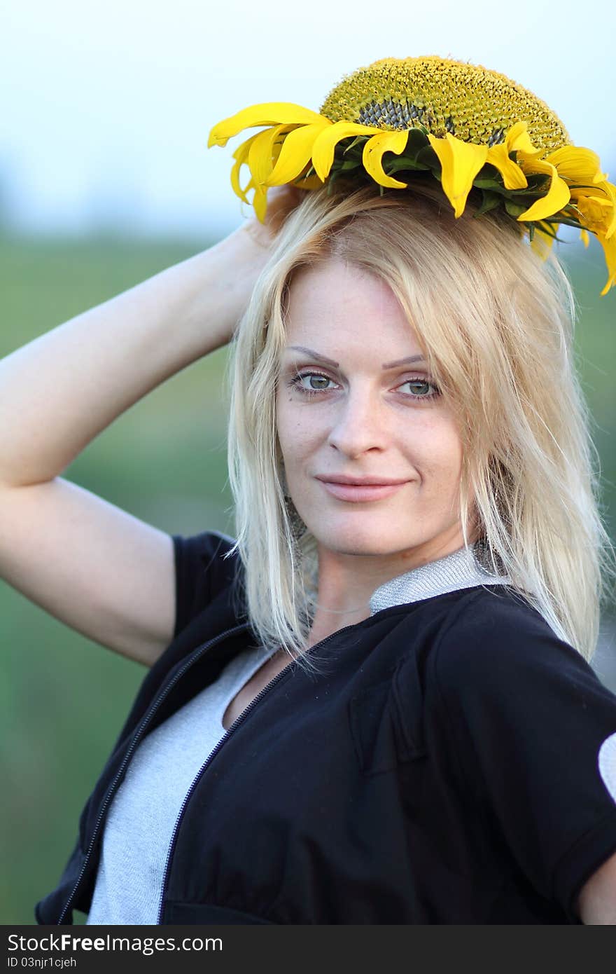 Beauty woman and sunflowers