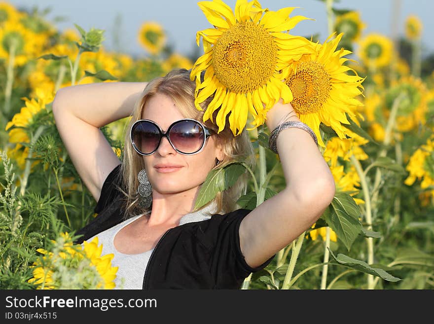 Beauty woman and sunflowers