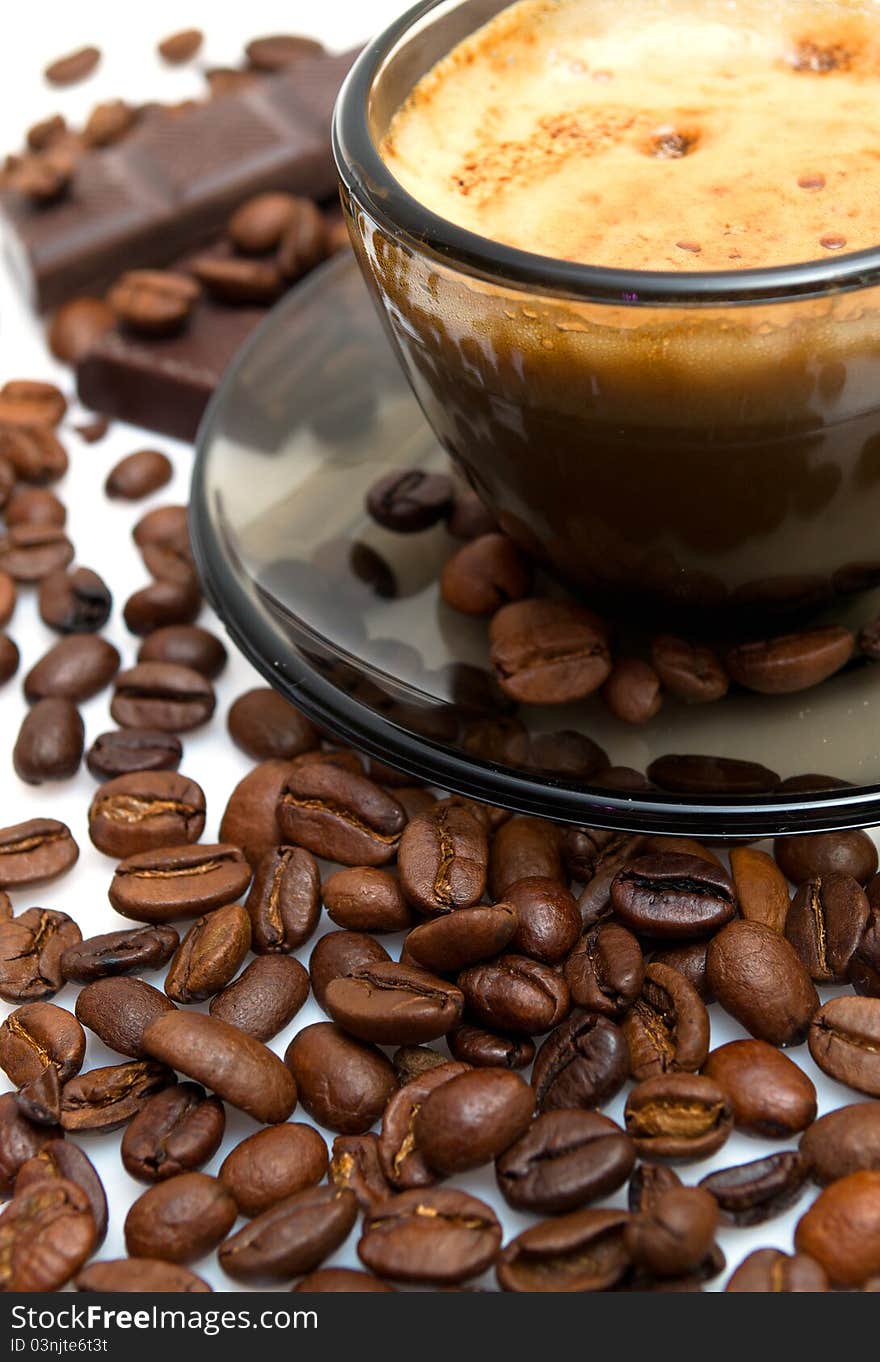 Cappuccino, brown sugar and coffee beans white background