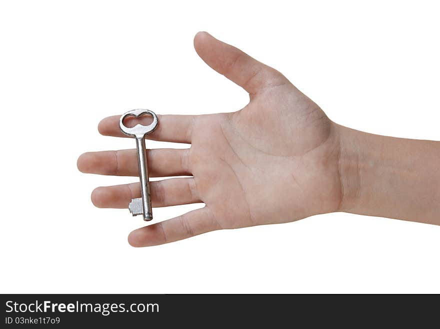 Boy's hand holding a key. Isolated on white background