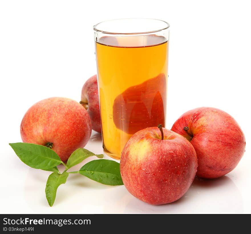 Ripe fruit and juice on a white background