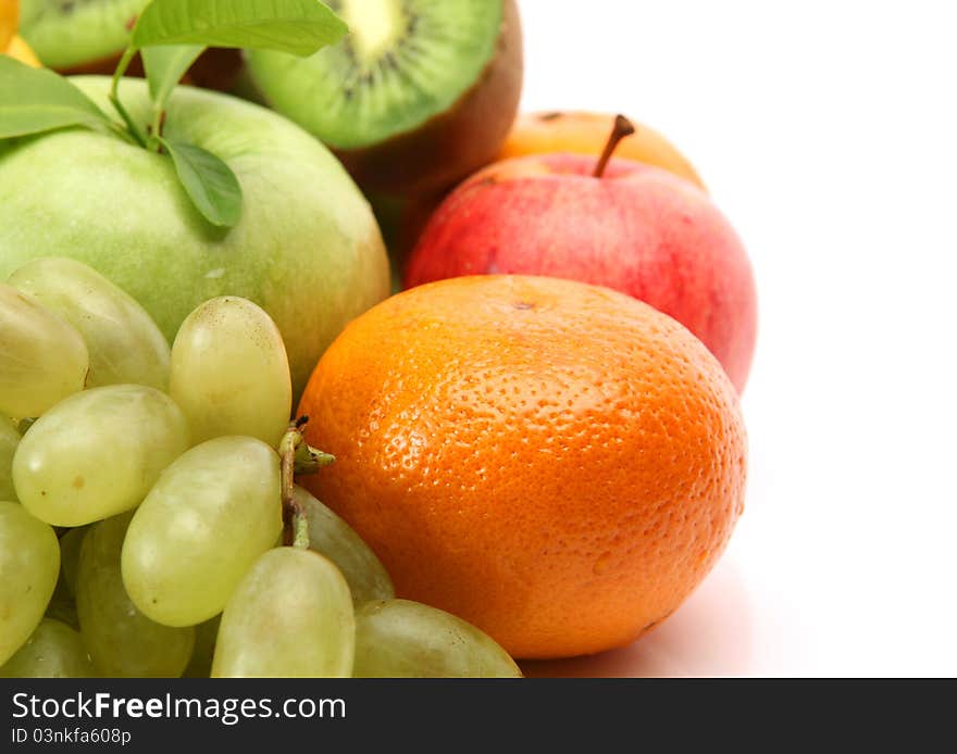 Ripe fruit on a white background