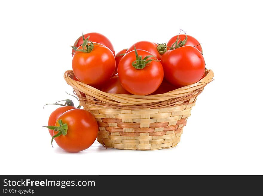 Ripe tomatoes in a wicker basket