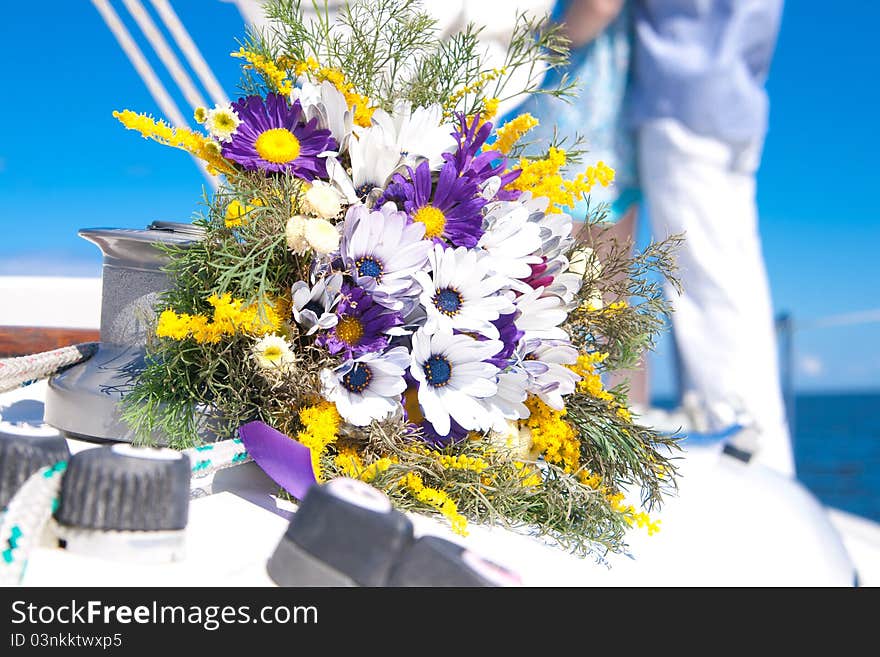 Bridal Bouquet On White Yacht