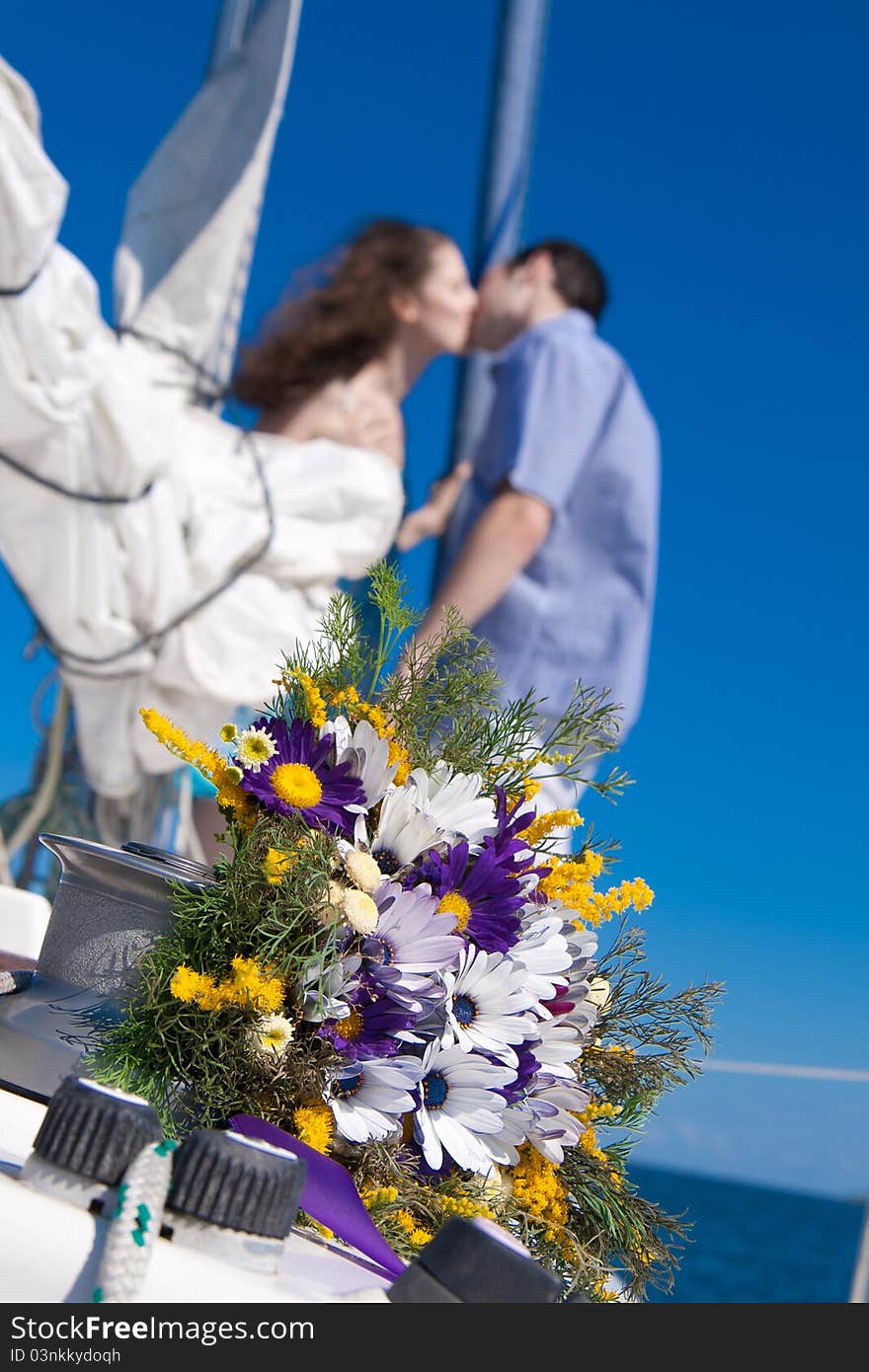 Bridal bouquet on white yacht