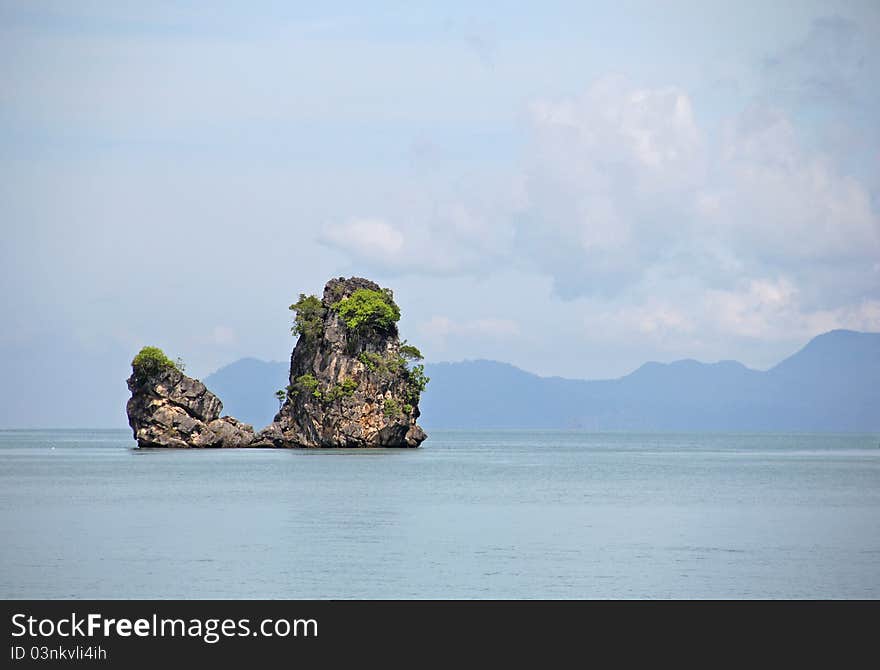 Lone rock at the sea