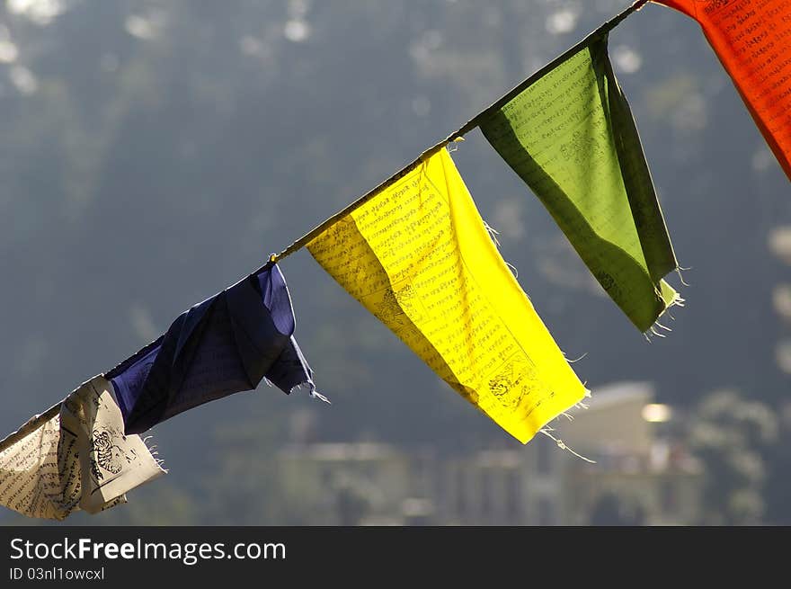 Detail of a colorful praying flags stratched across the walley. Detail of a colorful praying flags stratched across the walley