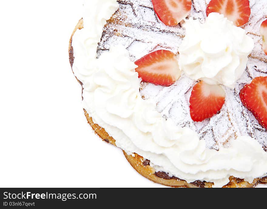 Waffle with strawberry and whipped cream, on a white background