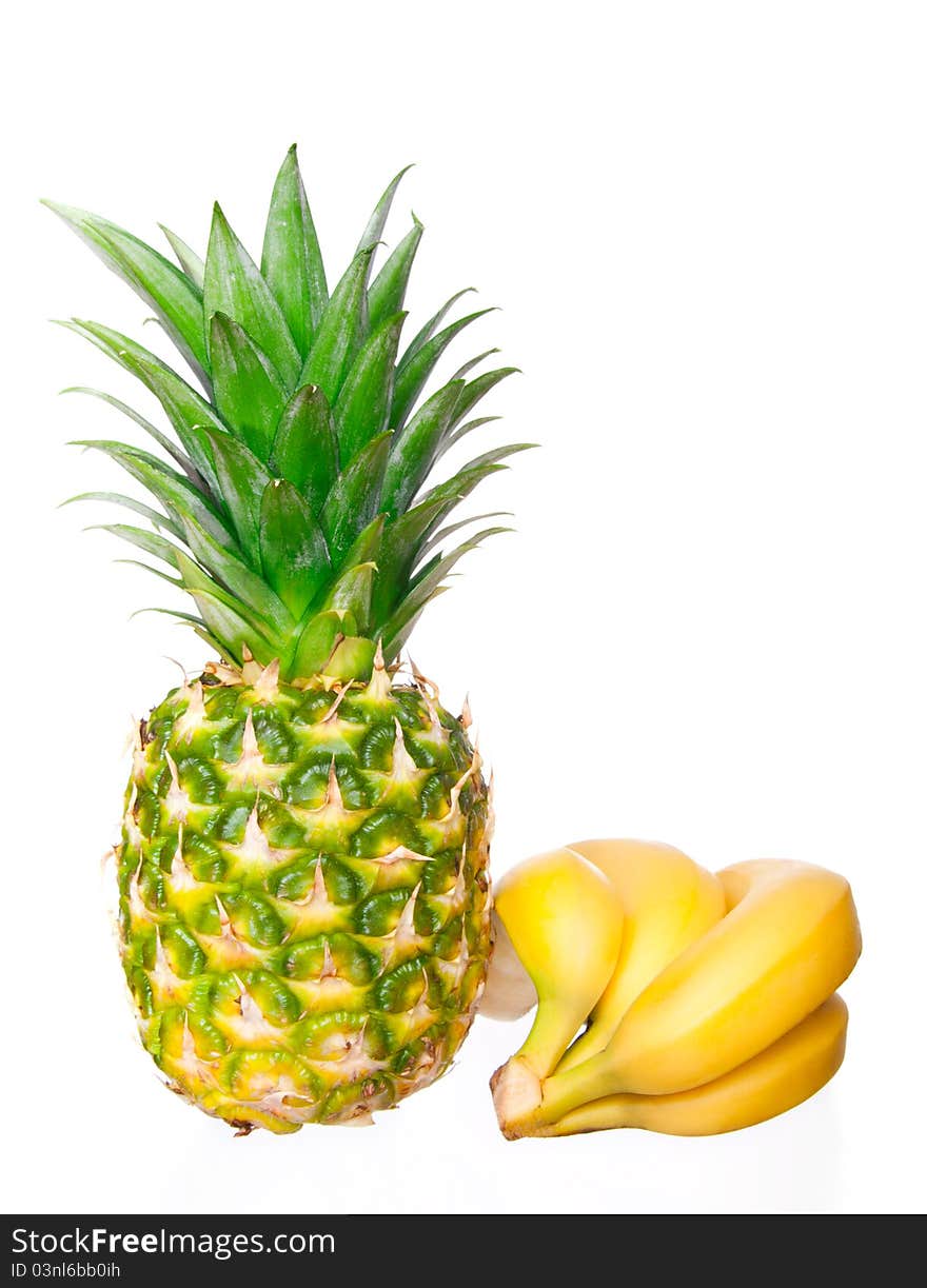 Ripe pineapple, bunch of bananas on a white background. Ripe pineapple, bunch of bananas on a white background